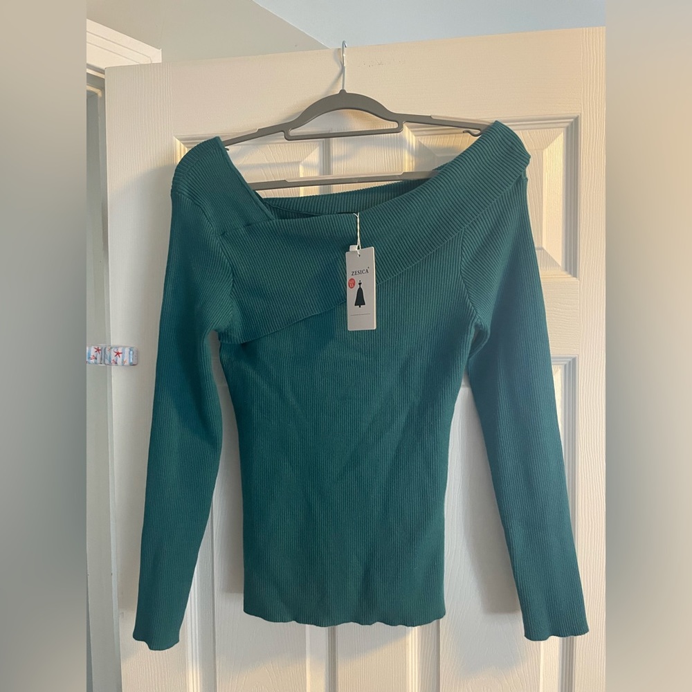 Green off the shoulder sweater. Perfect for the holidays!